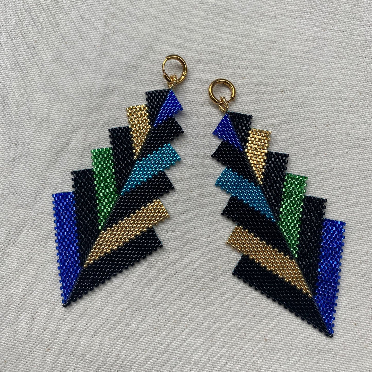 Aretes Prabhas Pavo Real - Asimétrico