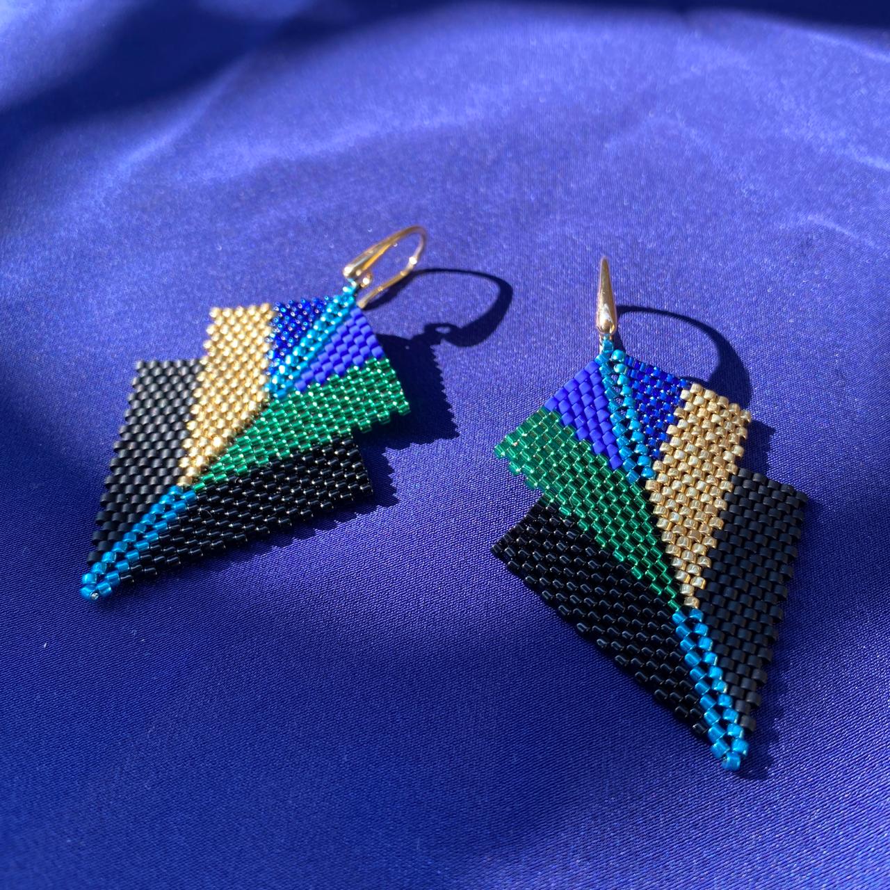 Aretes Centauri Pavo Real Negro