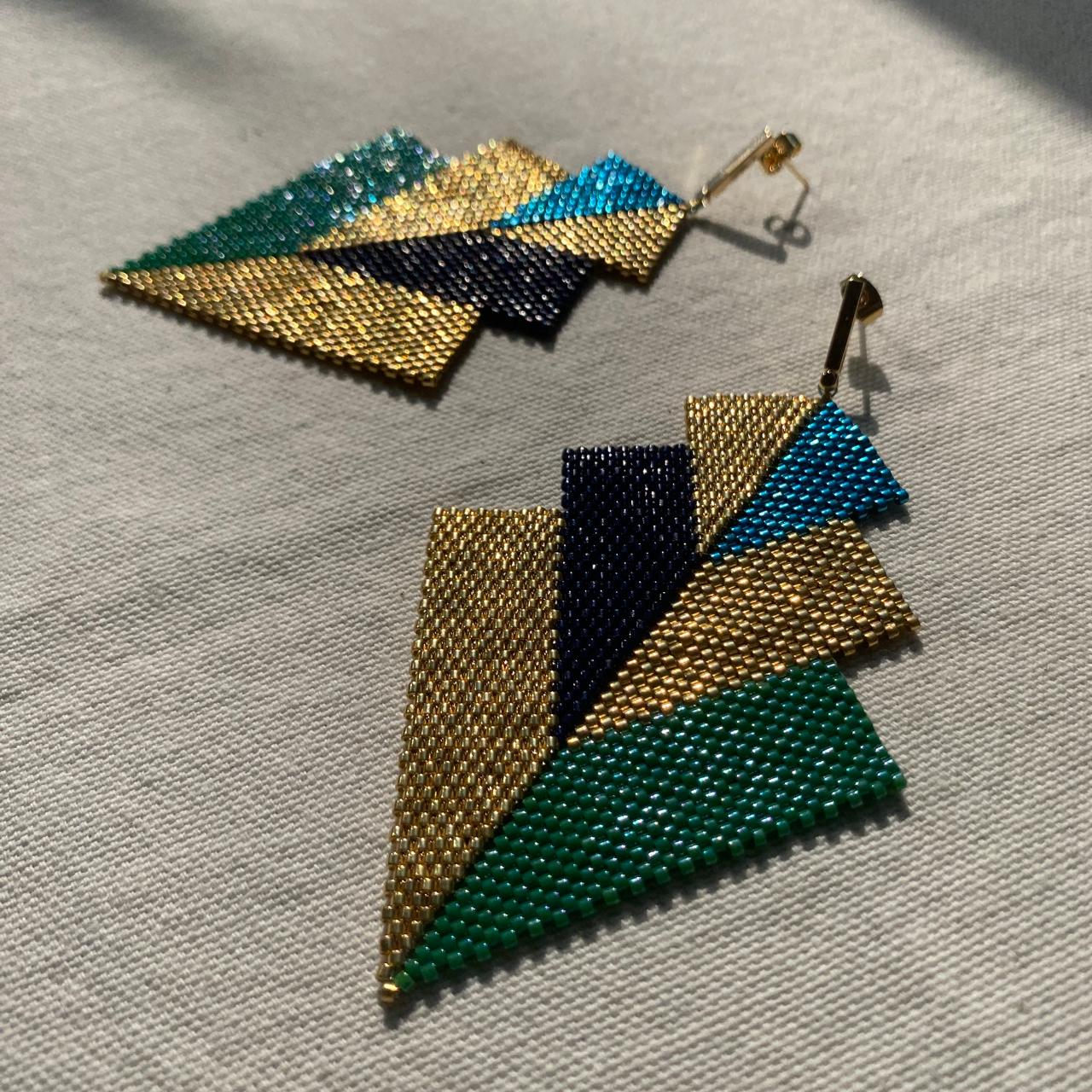 Aretes Cygni Pavo Real - Asimétrico