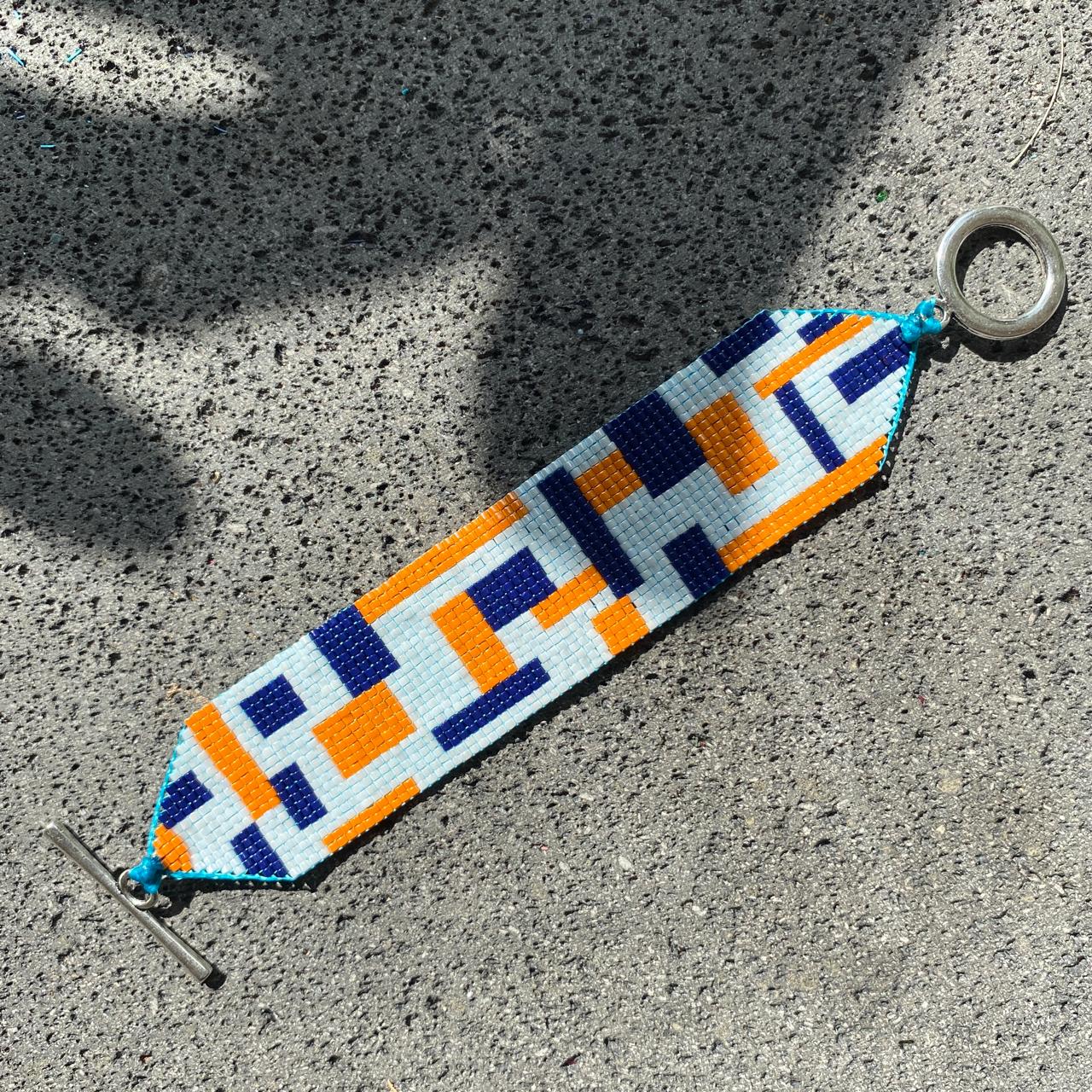 Conjunto Aretes Canopo y Pulsera Azul Marino, Blanco y Naranja