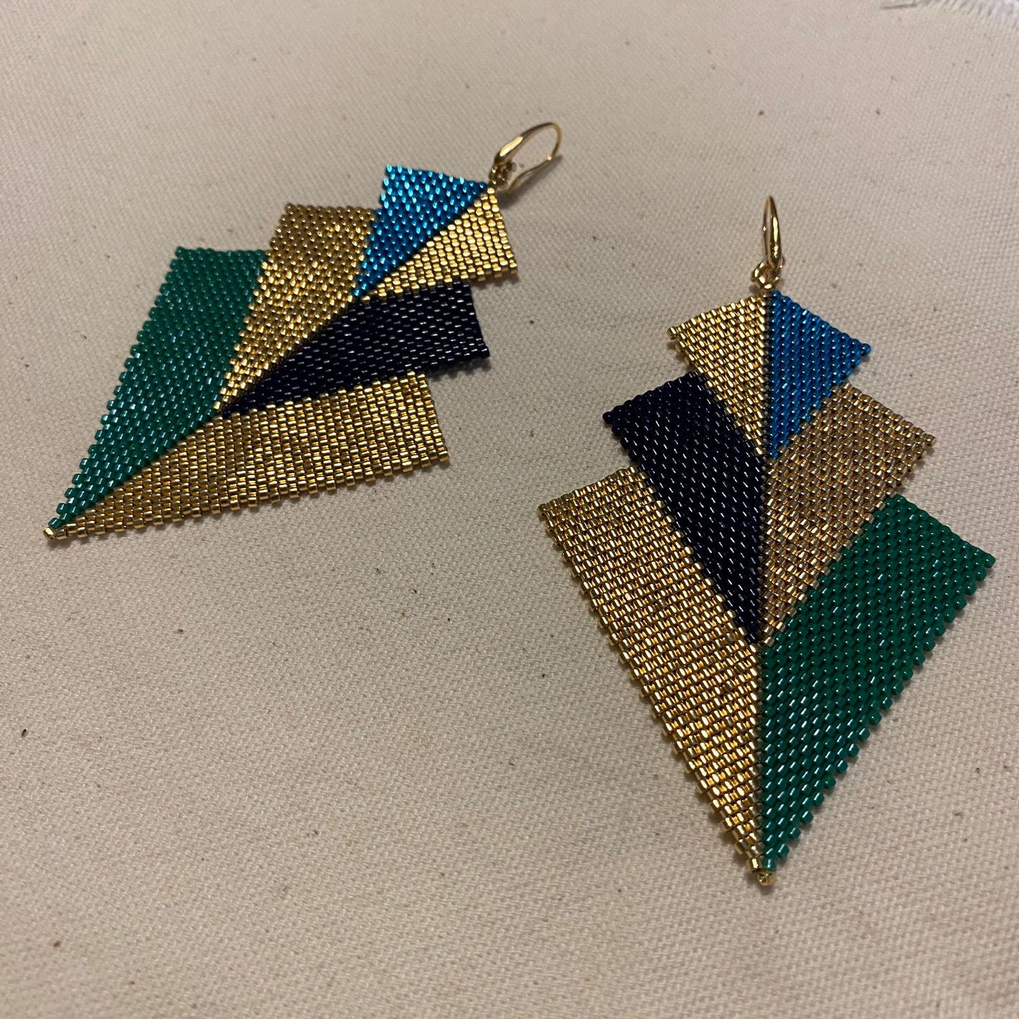 Aretes Cygni Pavo Real - Asimétrico