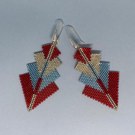 Aretes Rigel Rojo y Azul Claro
