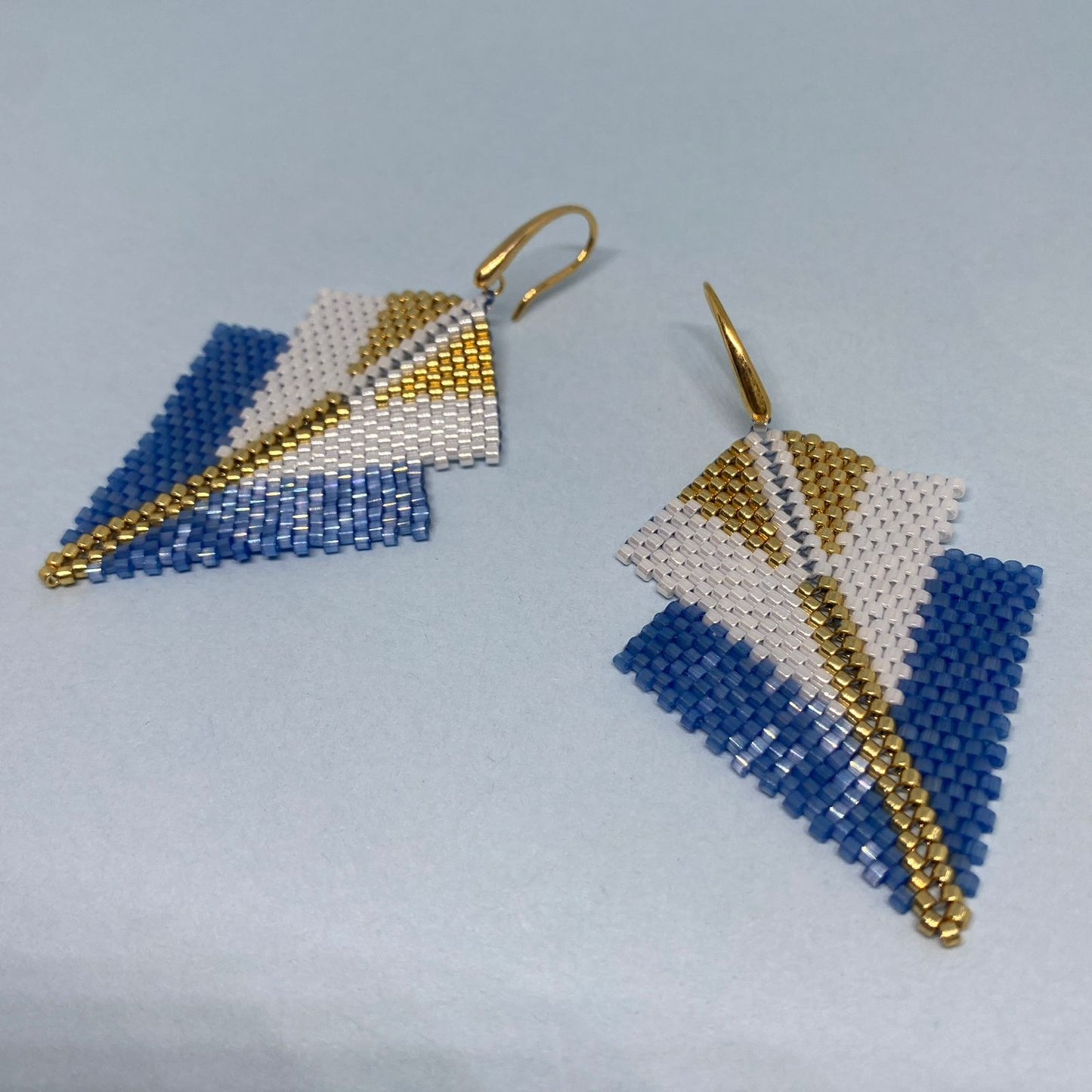 Conjunto Aretes Centauri y Pulsera Azul Escamas