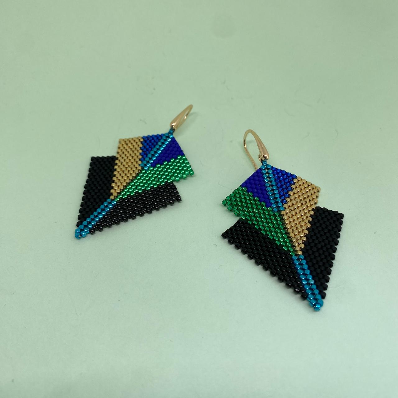 Aretes Centauri Pavo Real Negro