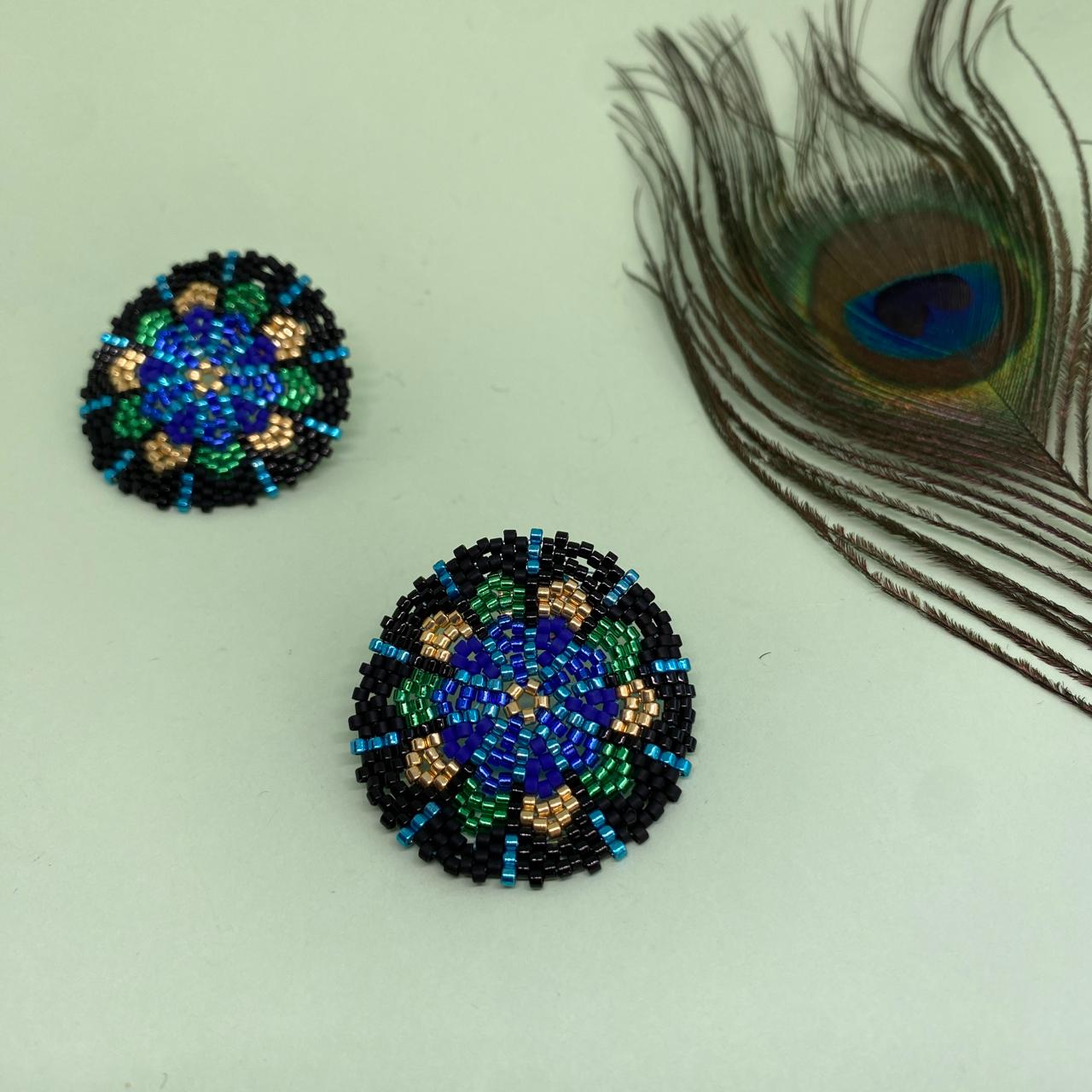 Aretes Juno Pavo Real