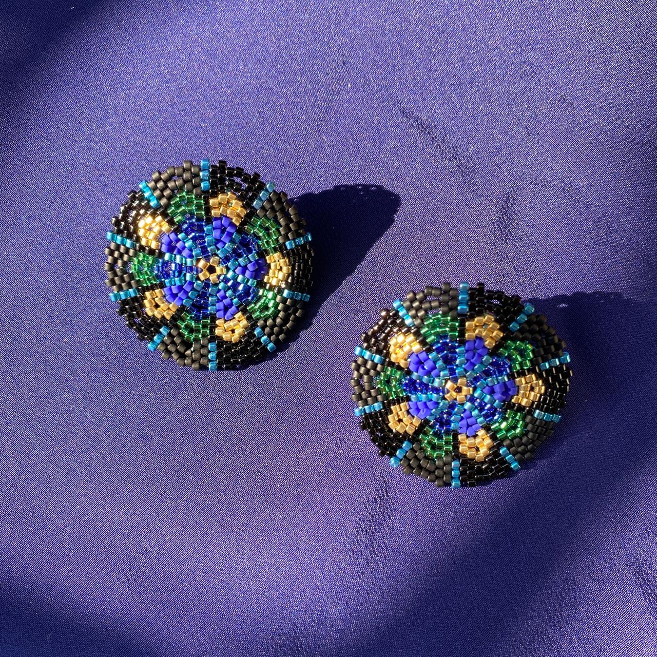 Aretes Juno Pavo Real