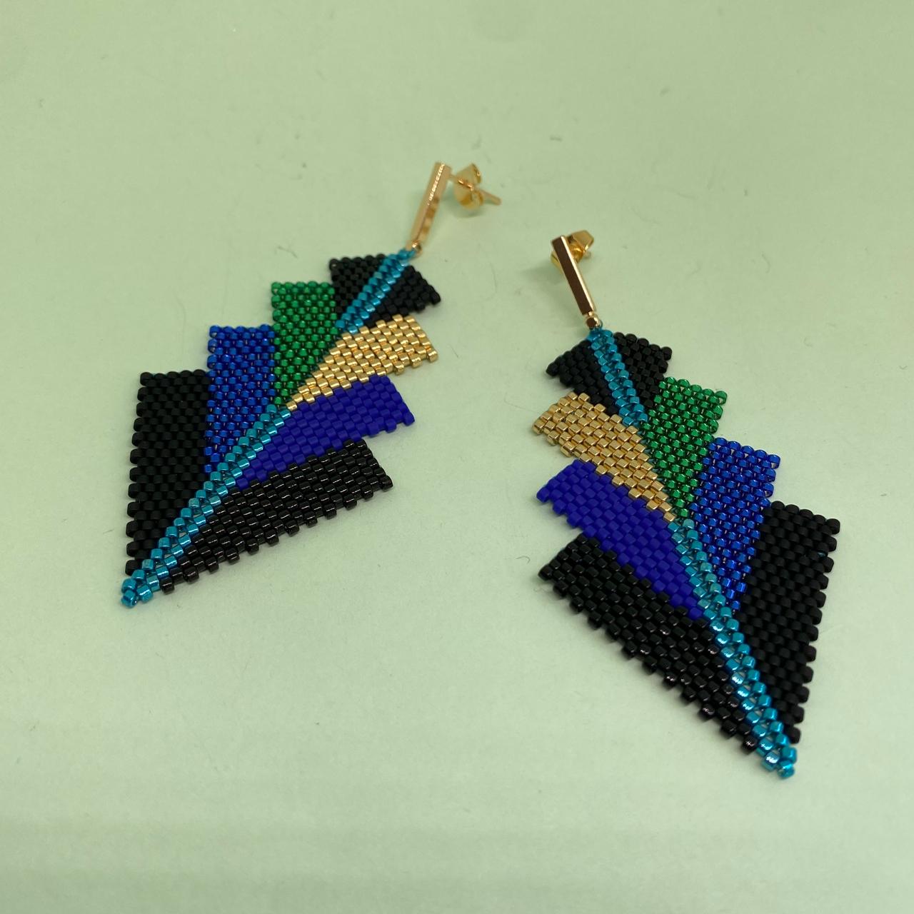 Aretes Rigel Pavo Real Negro