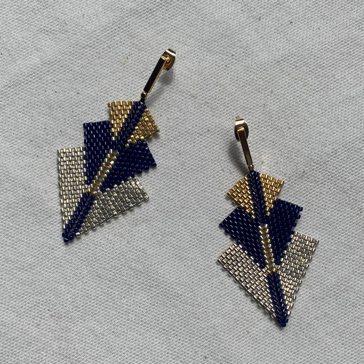 Aretes Mini Rigel Plateado, Dorado y Azul Marino