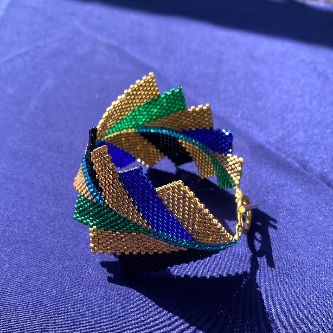 Brazalete Capella Pavo Real - Asimétrico