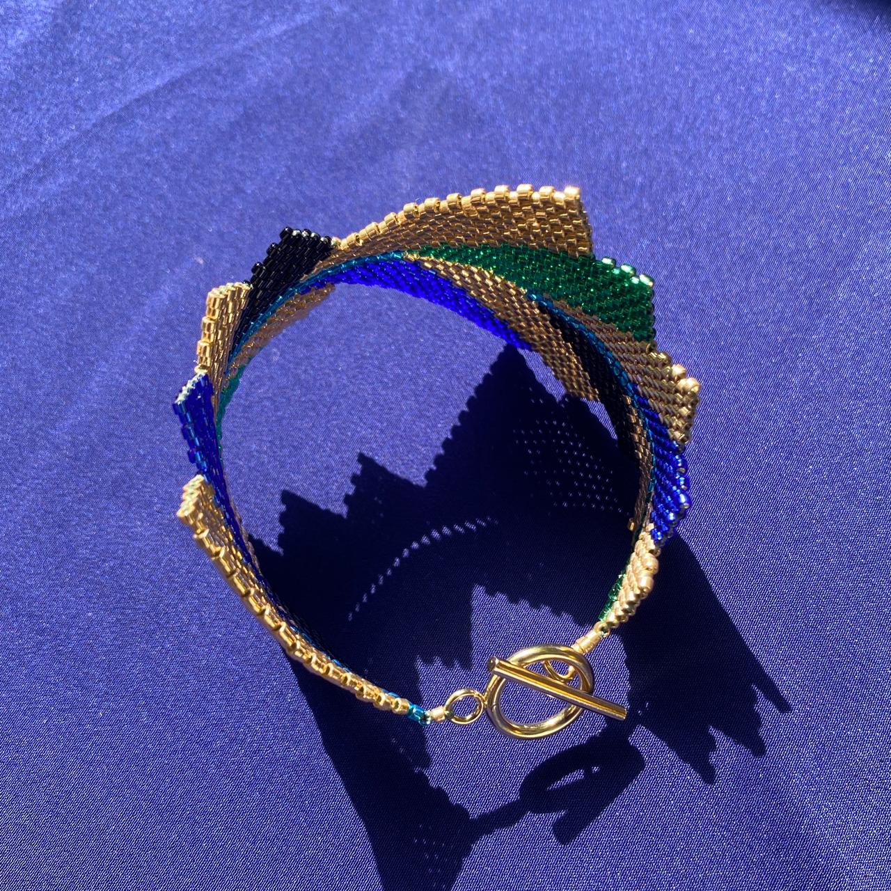 Brazalete Capella Pavo Real - Asimétrico