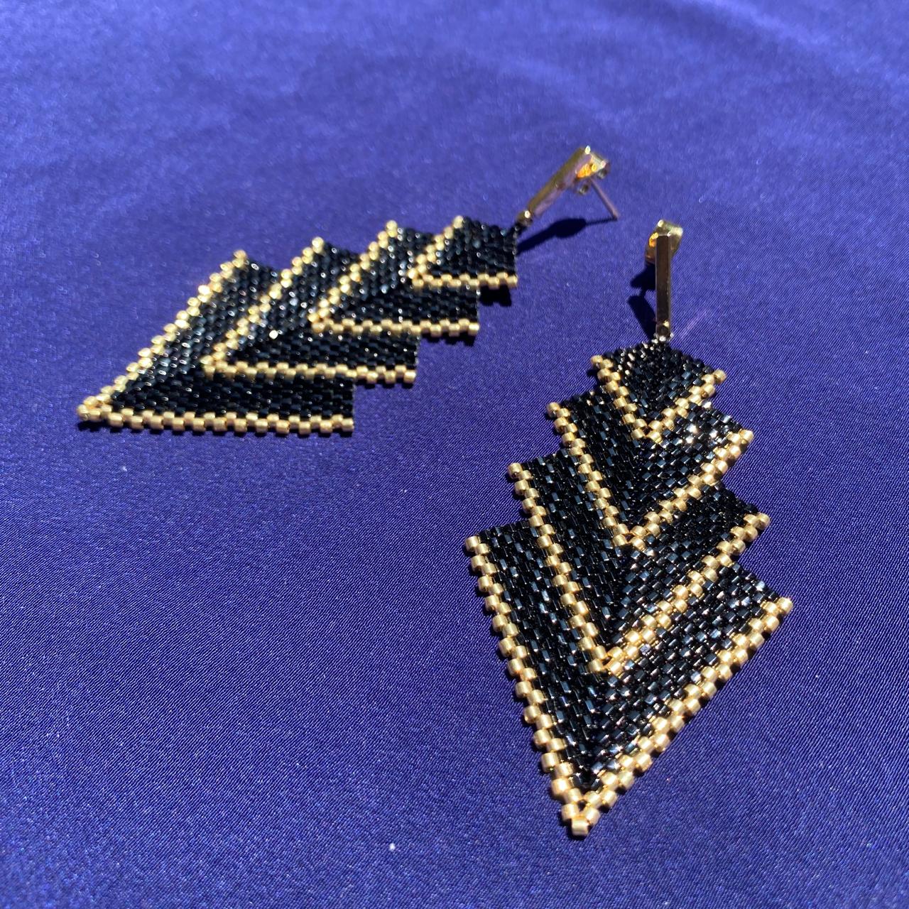 Aretes Rigel Negro y Dorado