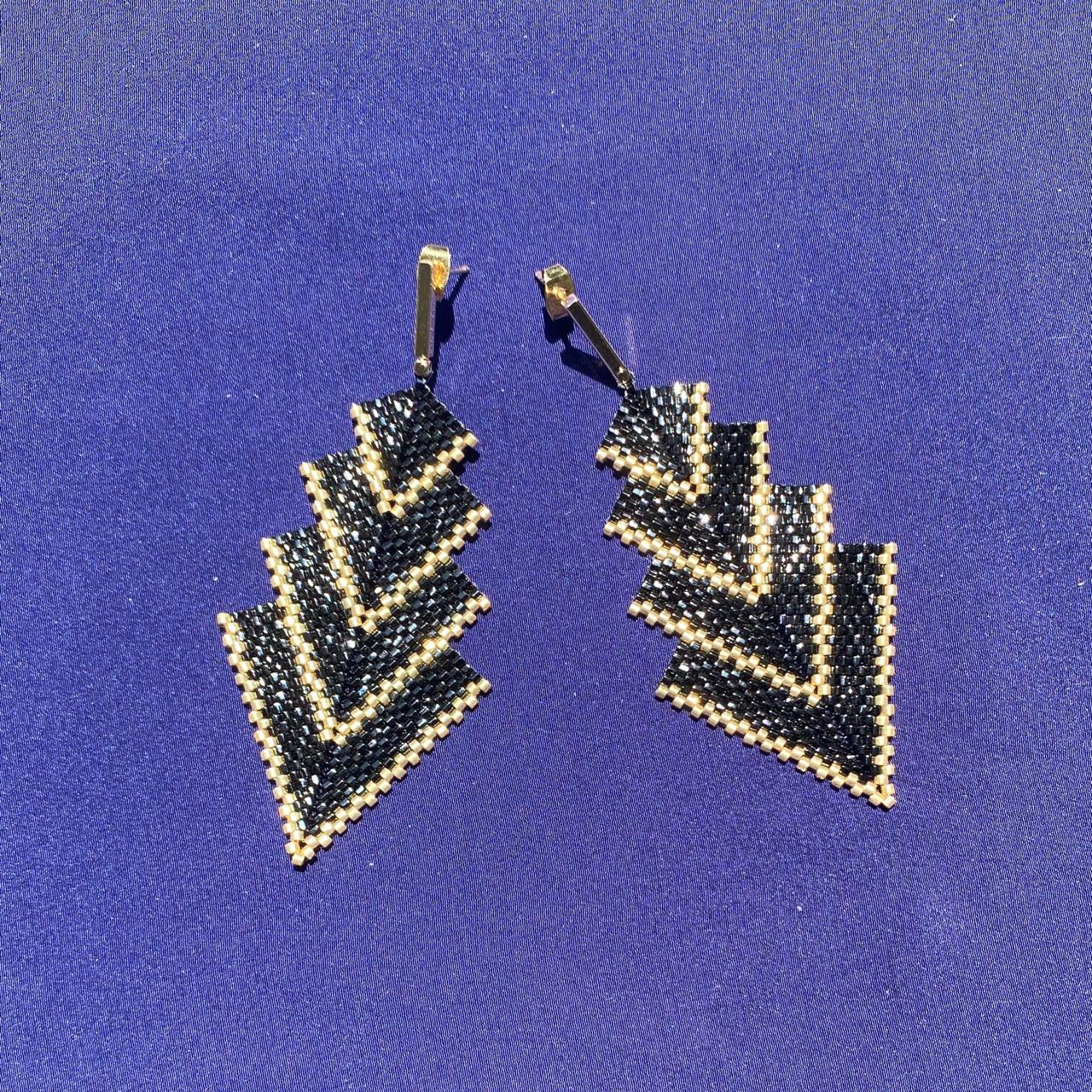 Aretes Rigel Negro y Dorado