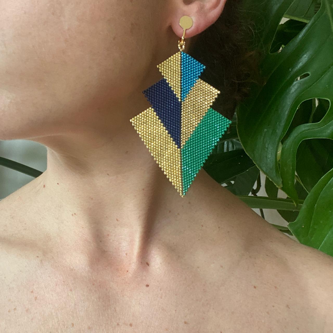 Aretes Cygni Pavo Real - Asimétrico