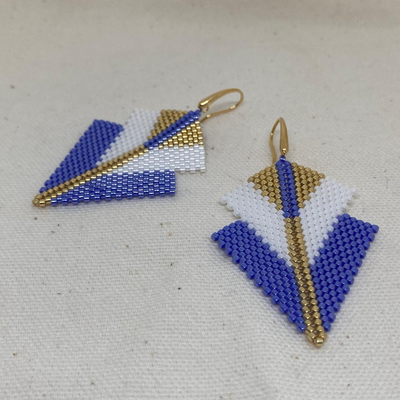 Aretes Centauri Morado y Blanco