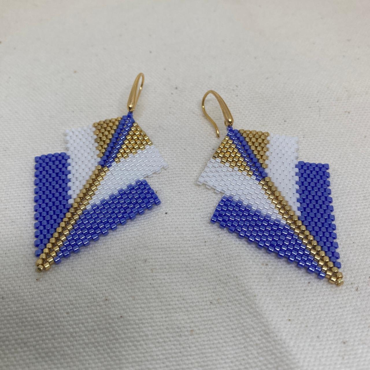Aretes Centauri Morado y Blanco