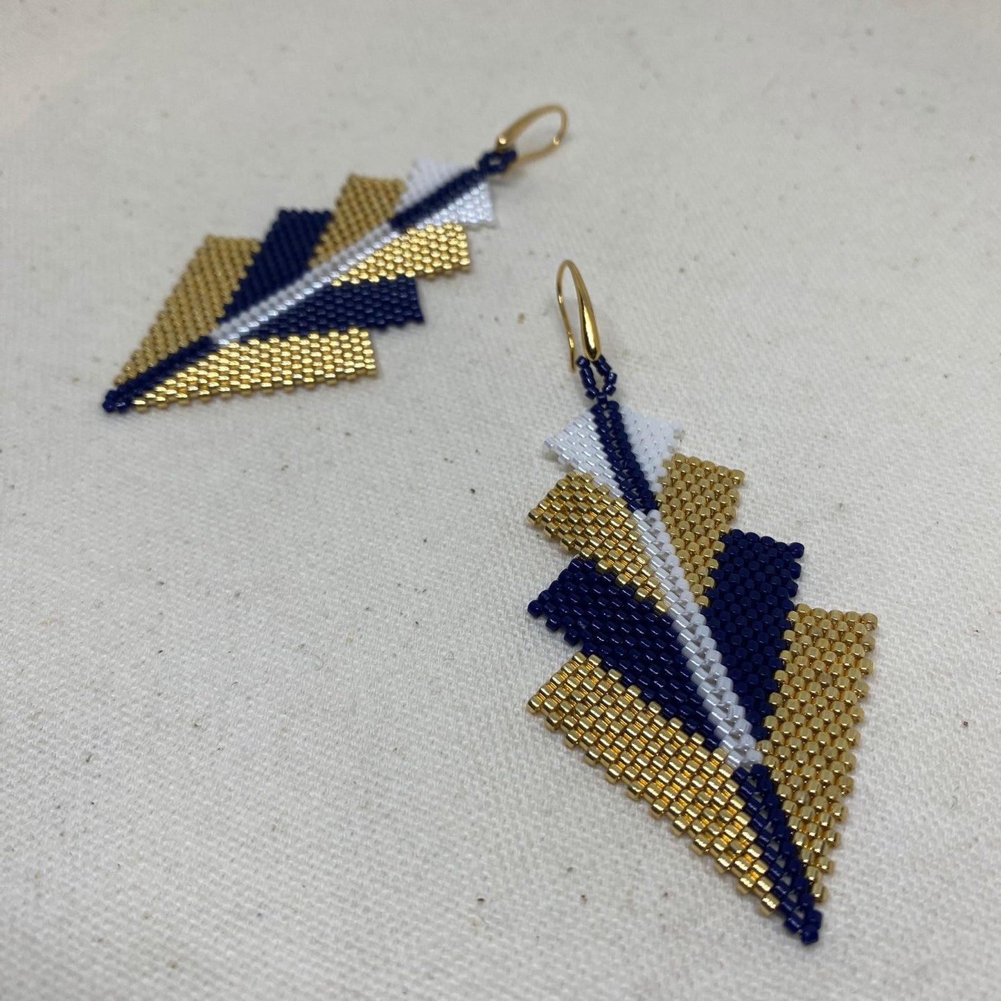 Aretes Rigel Azul Marino y Dorado