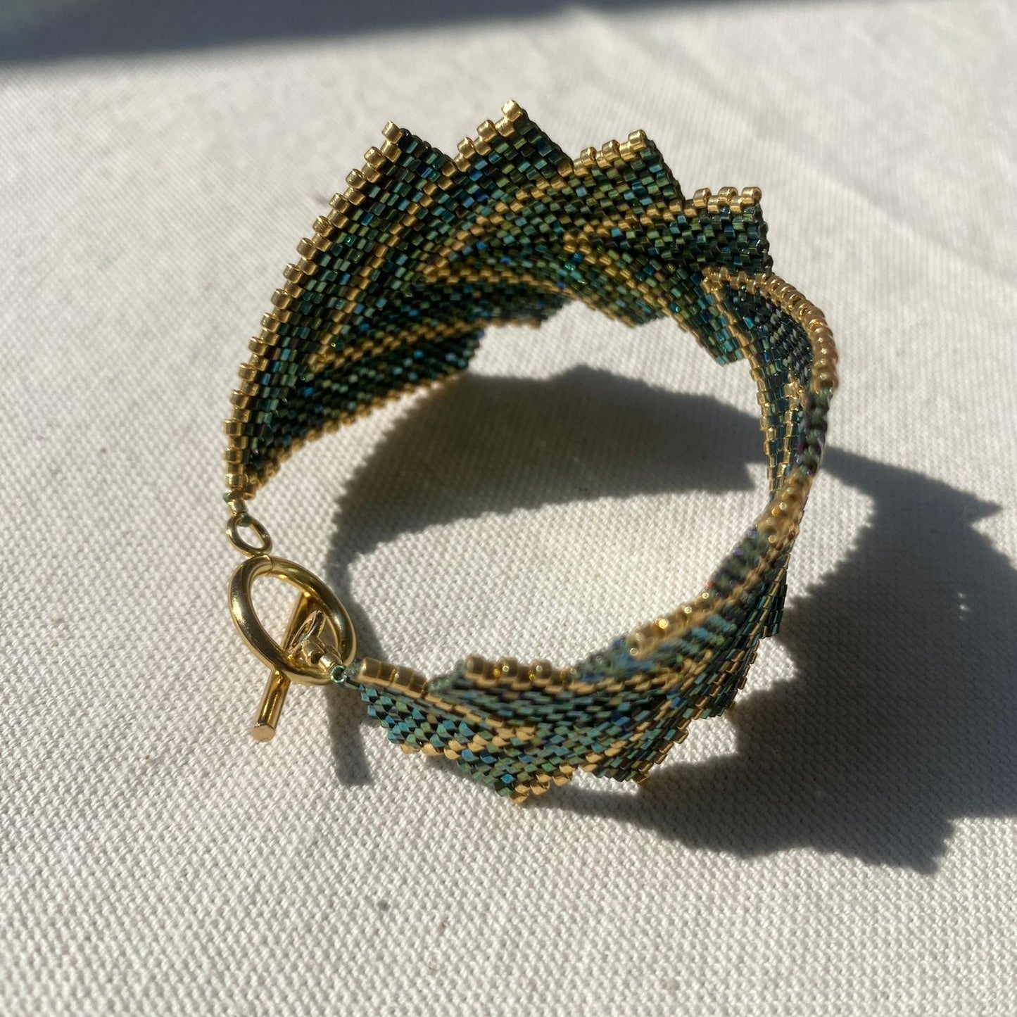 Pulsera Capella Verde y Dorado