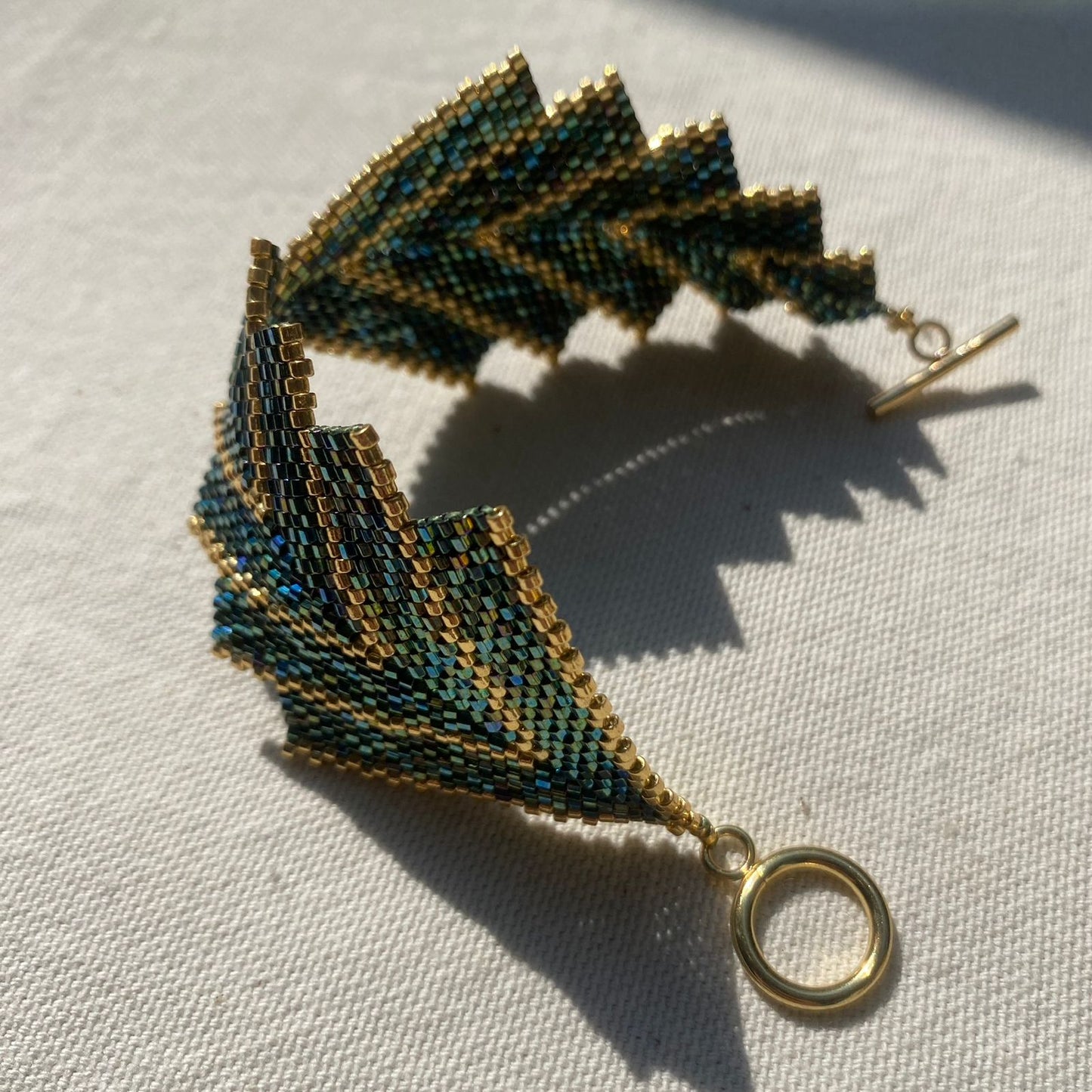 Pulsera Capella Verde y Dorado