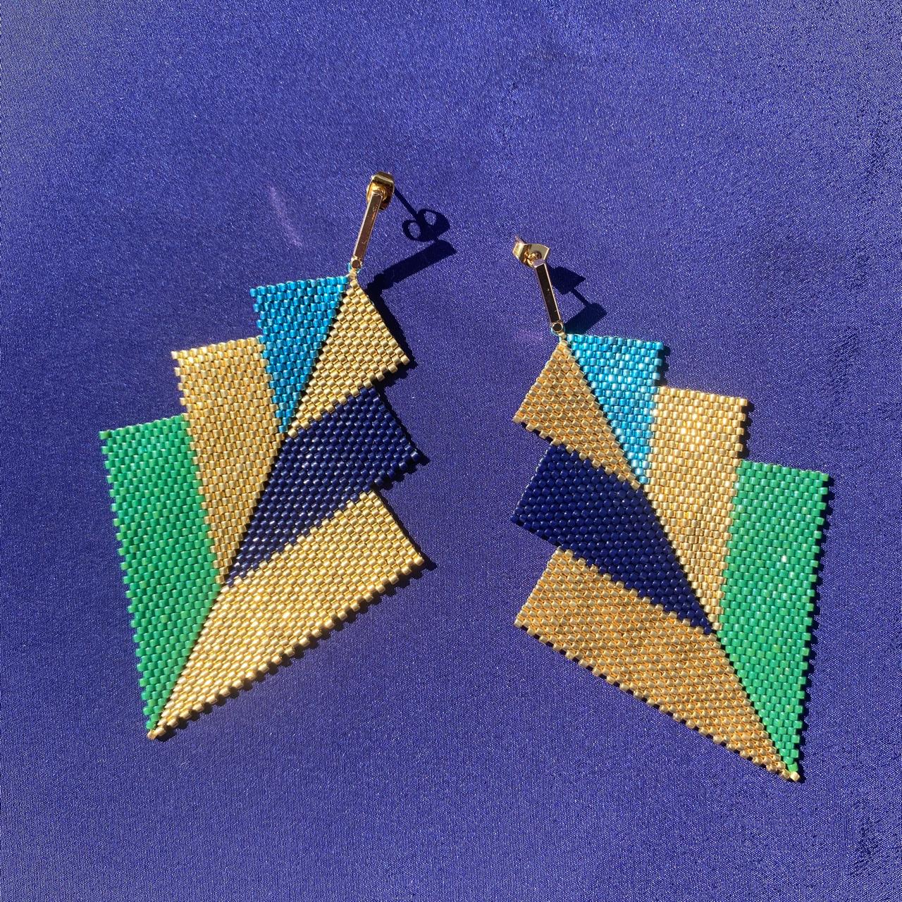Aretes Cygni Pavo Real - Asimétrico