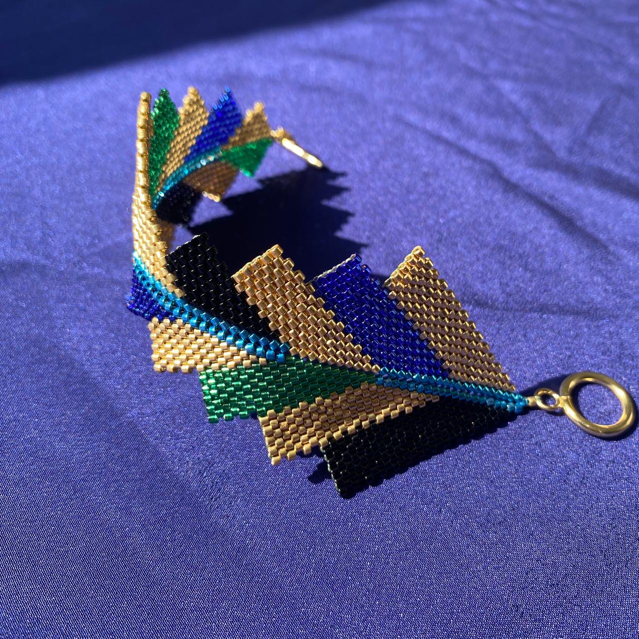 Brazalete Capella Pavo Real - Asimétrico