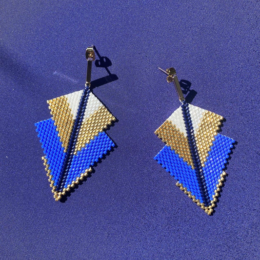 Aretes Centauri Azul Morado, Blanco, Azul Marino, y Dorado