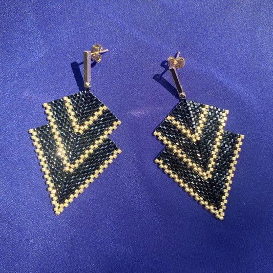 Aretes Centauri Negro y Dorado